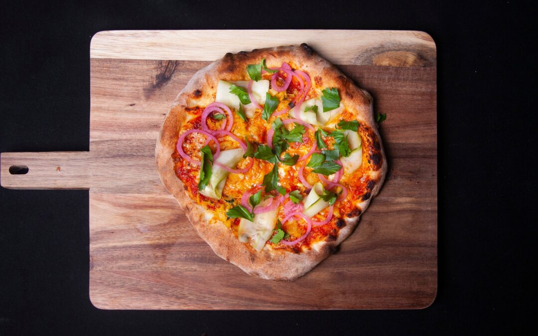 Recept van pizza met Surinaamse roots